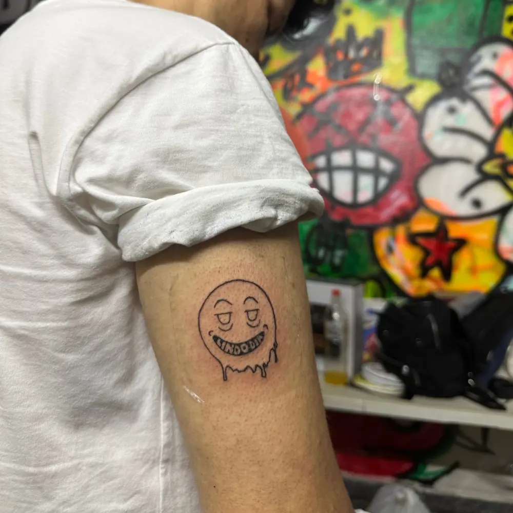 Tatuaje en el brazo hecho en Lindo Dia Tattoo Studio